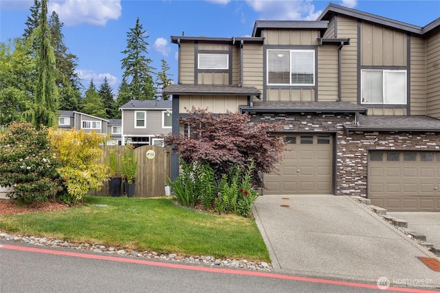 2015 79th St SE, Everett, WA 98203 - view of front of property featuring board and batten siding, concrete driveway, and an attached garage