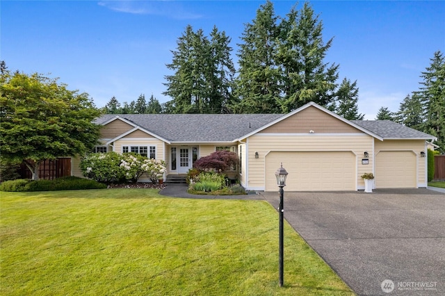 4703 235th St E, Spanaway, WA 98387 - ranch-style house with a garage, asphalt driveway, and roof with shingles