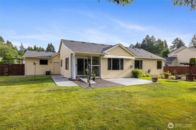 4703 235th St E, Spanaway, WA 98387 - rear view of house with a patio, roof with shingles, and a gate