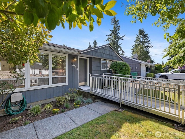 14324 Wayne Pl N, Seattle, WA 98133 - ranch-style house with a wooden deck and a front yard