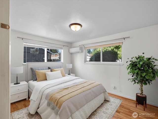 14324 Wayne Pl N, Seattle, WA 98133 - bedroom featuring a wall mounted AC and wood finished floors