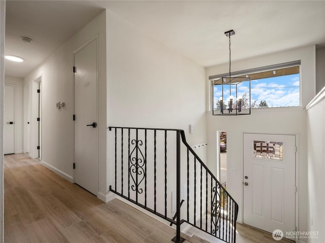 17301 6th Ave E, Spanaway, WA 98387 - entrance foyer with a chandelier and wood finished floors