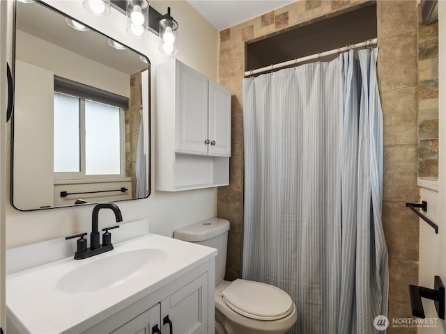 17301 6th Ave E, Spanaway, WA 98387 - full bath featuring tile walls, vanity, and a shower with shower curtain