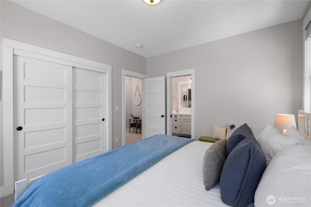 173 Meriweather St, Pacific Beach, WA 98571 - carpeted bedroom featuring a closet and ensuite bath