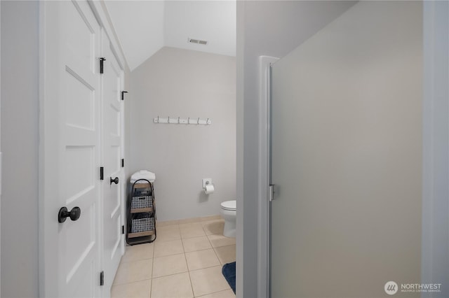 173 Meriweather St, Pacific Beach, WA 98571 - bathroom featuring lofted ceiling, tile patterned floors, and a shower with door