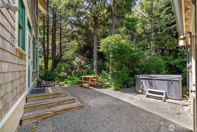 173 Meriweather St, Pacific Beach, WA 98571 - view of yard featuring a hot tub and a patio