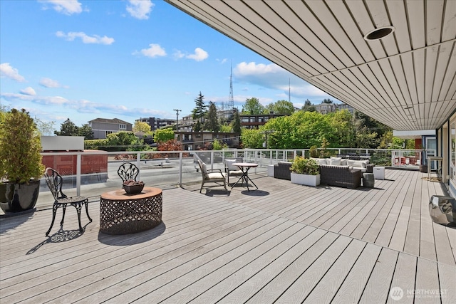 1730 Taylor Ave N Unit 502, Seattle, WA 98109 - wooden deck with outdoor lounge area