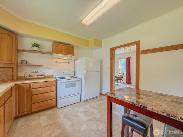 5302 Rockefeller Ave, Everett, WA 98203 - kitchen with white appliances, under cabinet range hood, open shelves, a breakfast bar area, and light countertops
