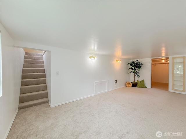5302 Rockefeller Ave, Everett, WA 98203 - unfurnished room featuring carpet and stairway