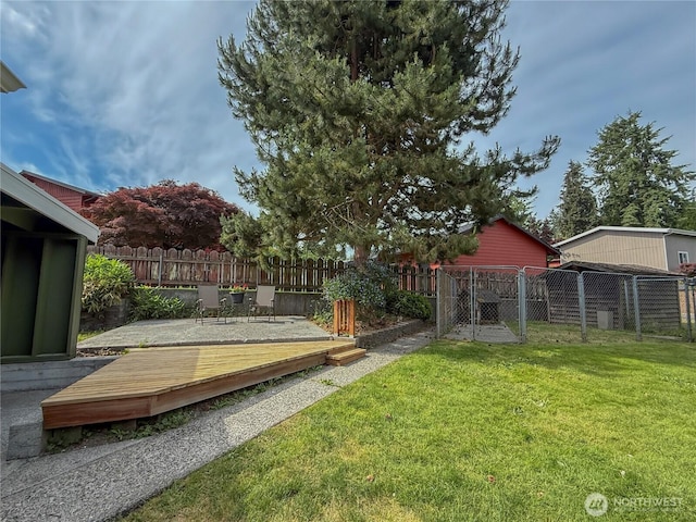 5302 Rockefeller Ave, Everett, WA 98203 - fenced backyard with a deck