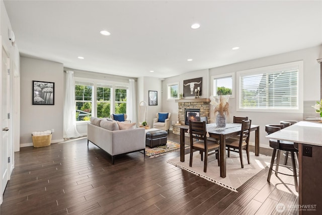 795 NE 2nd St, North Bend, WA 98045 - dining area featuring a fireplace, dark wood-style flooring, and recessed lighting