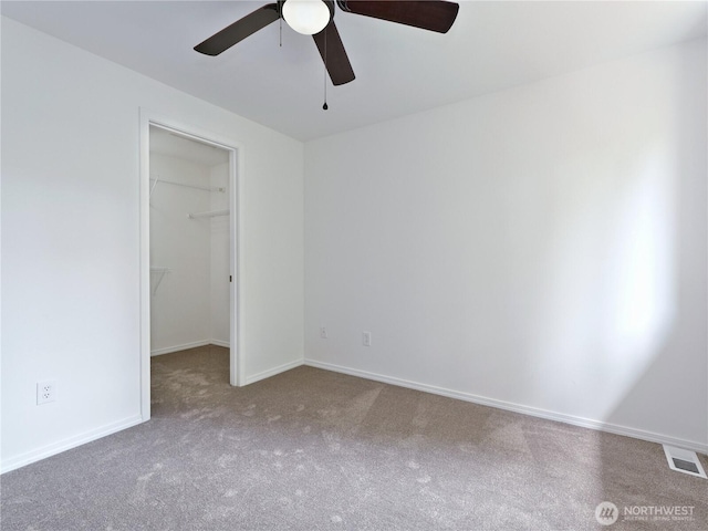 10105 6th Dr SE Unit B, Everett, WA 98208 - unfurnished bedroom featuring carpet, a spacious closet, a closet, and ceiling fan