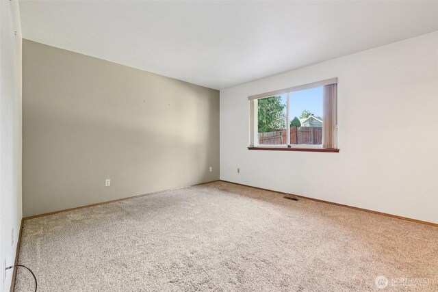 21850 SE 271st Pl, Maple Valley, WA 98038 - carpeted empty room with baseboards