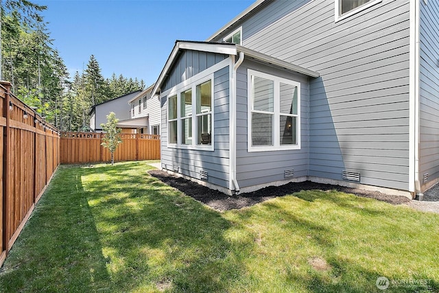 18740 130th St E, Bonney Lake, WA 98391 - view of home's exterior featuring a fenced backyard and crawl space