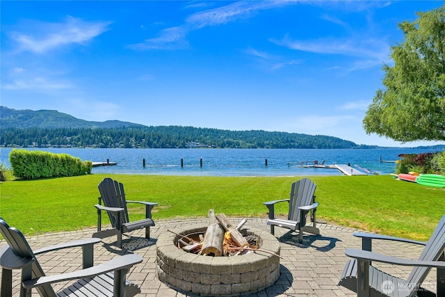3231 Northshore Rd, Bellingham, WA 98226 - view of patio featuring a fire pit, a water and mountain view, and a forest view