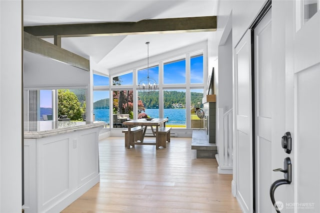 3231 Northshore Rd, Bellingham, WA 98226 - hall with a chandelier, light wood-type flooring, and a water view