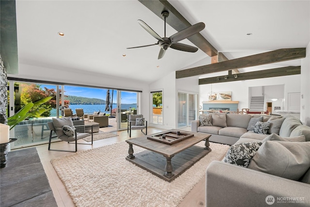 3231 Northshore Rd, Bellingham, WA 98226 - living area with a ceiling fan, beamed ceiling, a water view, wood finished floors, and recessed lighting