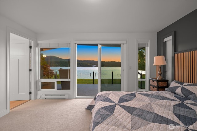 3231 Northshore Rd, Bellingham, WA 98226 - carpeted bedroom with baseboard heating, access to outside, and a water view