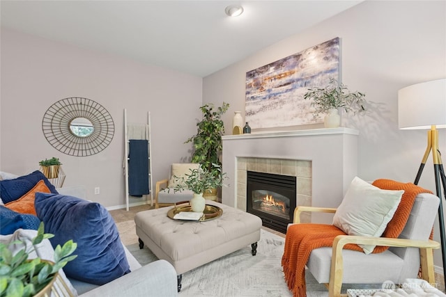 2147 Hammond Ave Unit B10, Dupont, WA 98327 - living room featuring a tiled fireplace and baseboards
