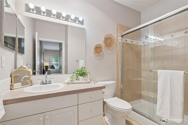 2147 Hammond Ave Unit B10, Dupont, WA 98327 - bathroom with vanity, a shower stall, and ensuite bath