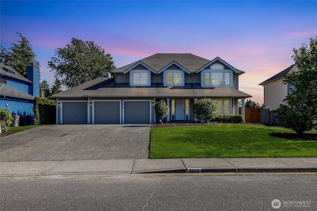 9825 S 246th Pl, Kent, WA 98030 - traditional-style home featuring driveway, a garage, a shingled roof, and covered porch