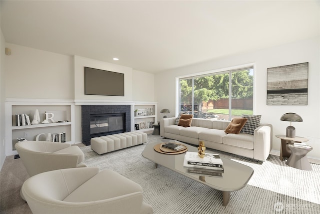 9825 S 246th Pl, Kent, WA 98030 - living area featuring a glass covered fireplace, built in shelves, and recessed lighting