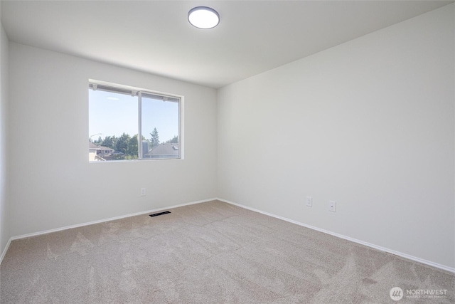 9825 S 246th Pl, Kent, WA 98030 - carpeted spare room with baseboards