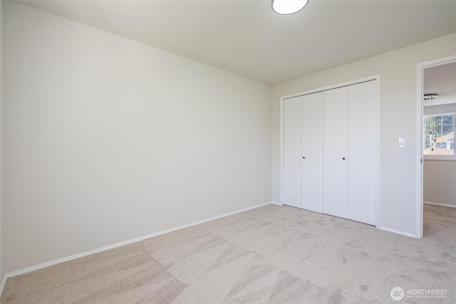 9825 S 246th Pl, Kent, WA 98030 - unfurnished bedroom featuring carpet flooring and a closet