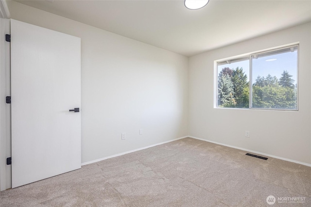 9825 S 246th Pl, Kent, WA 98030 - unfurnished room featuring carpet flooring and baseboards