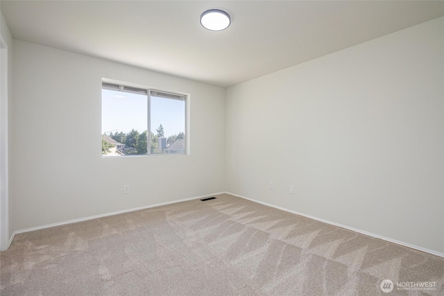 9825 S 246th Pl, Kent, WA 98030 - carpeted spare room featuring baseboards