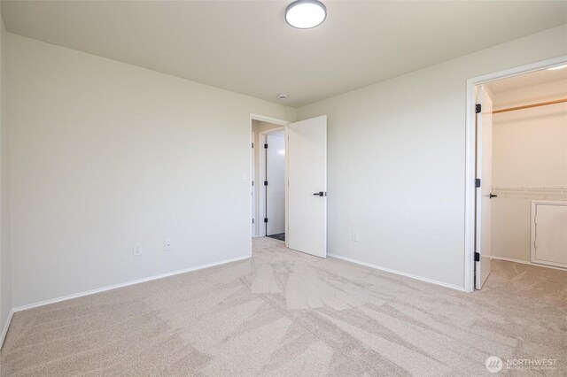 9825 S 246th Pl, Kent, WA 98030 - unfurnished bedroom with light carpet and a spacious closet