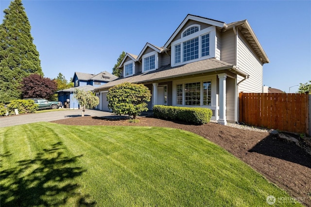9825 S 246th Pl, Kent, WA 98030 - traditional-style house featuring driveway and a garage