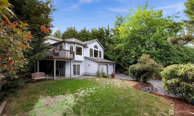 21 Longshore Ln, Bellingham, WA 98229 - back of house with a garage, a yard, and a deck