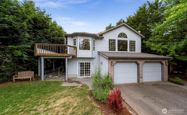 21 Longshore Ln, Bellingham, WA 98229 - back of house with an attached garage, asphalt driveway, a lawn, a deck, and roof with shingles