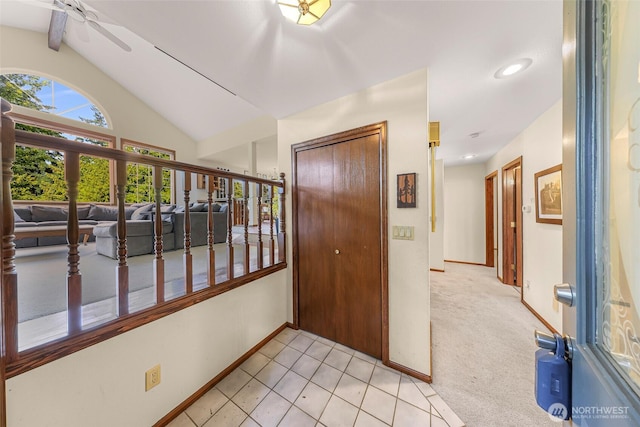 21 Longshore Ln, Bellingham, WA 98229 - entryway with ceiling fan, light colored carpet, and light tile patterned floors