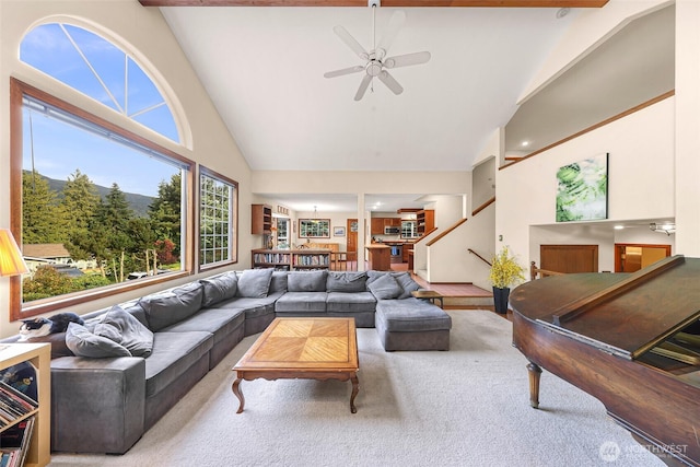 21 Longshore Ln, Bellingham, WA 98229 - living room featuring high vaulted ceiling, a ceiling fan, carpet, and stairway