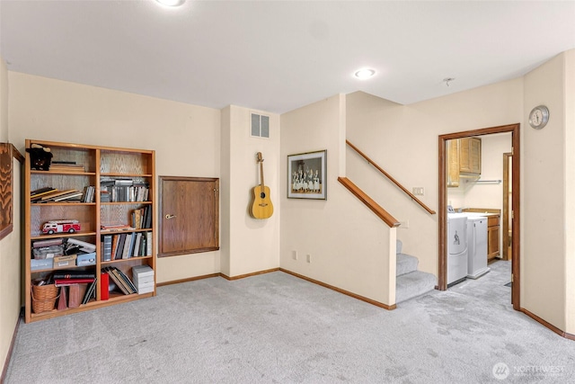 21 Longshore Ln, Bellingham, WA 98229 - carpeted spare room featuring stairway and washer / dryer