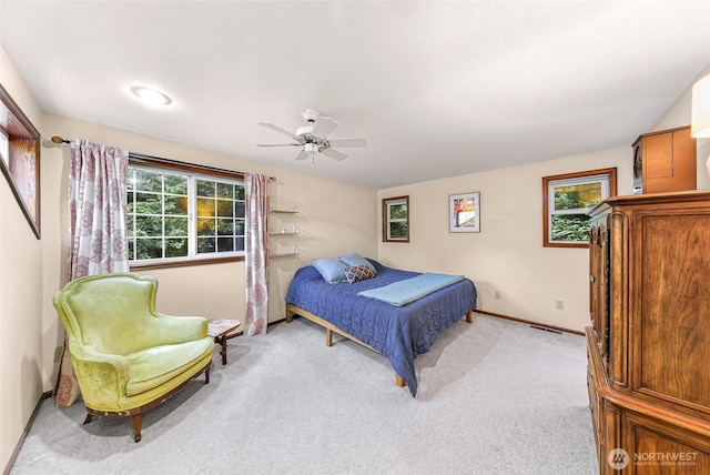 21 Longshore Ln, Bellingham, WA 98229 - bedroom with light colored carpet and a ceiling fan