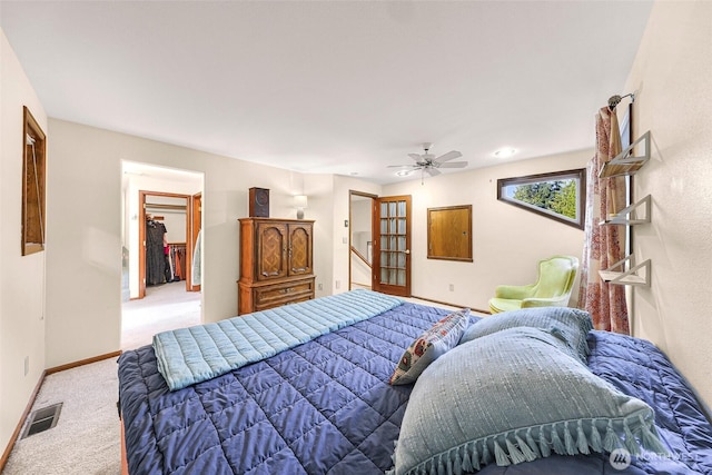 21 Longshore Ln, Bellingham, WA 98229 - carpeted bedroom with a ceiling fan and a walk in closet