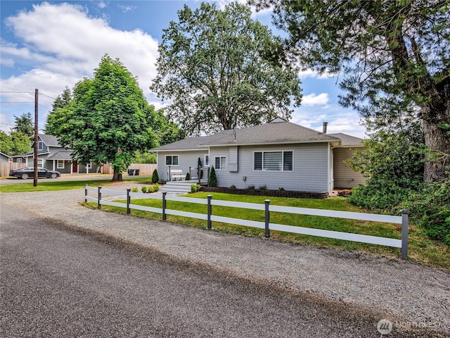 404 Nixon St S, Roy, WA 98580 - view of front of property with a front lawn and roof with shingles