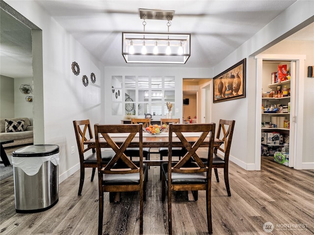 404 Nixon St S, Roy, WA 98580 - dining room featuring wood finished floors and baseboards