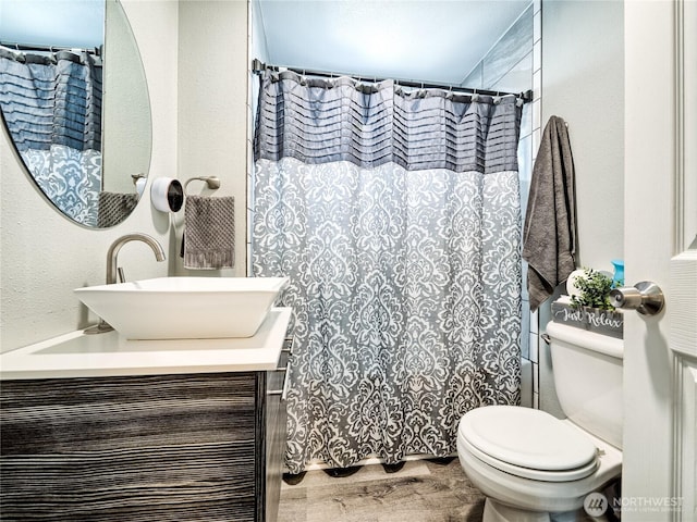 404 Nixon St S, Roy, WA 98580 - bathroom with vanity, wood finished floors, and curtained shower