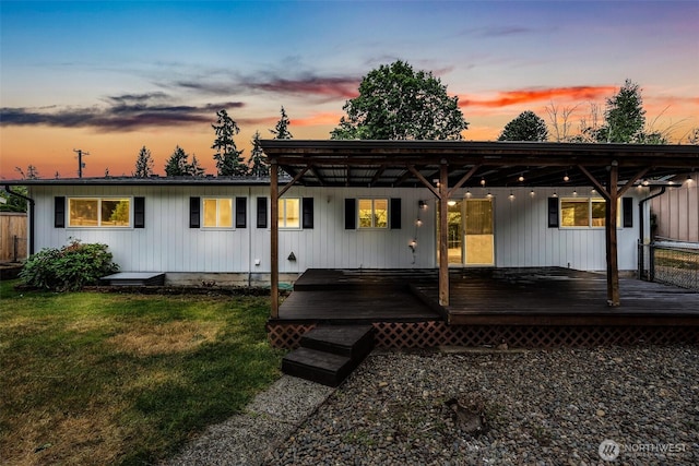4801 78th St E, Tacoma, WA 98443 - back of house with a lawn and a wooden deck