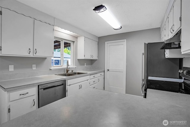 4801 78th St E, Tacoma, WA 98443 - kitchen featuring under cabinet range hood, stainless steel appliances, white cabinets, light countertops, and a textured ceiling