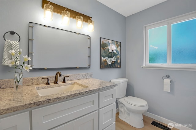 4801 78th St E, Tacoma, WA 98443 - bathroom featuring vanity and wood finished floors