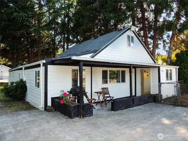 14808 131st Ave SE, Renton, WA 98058 - rear view of house featuring a patio area and a gate