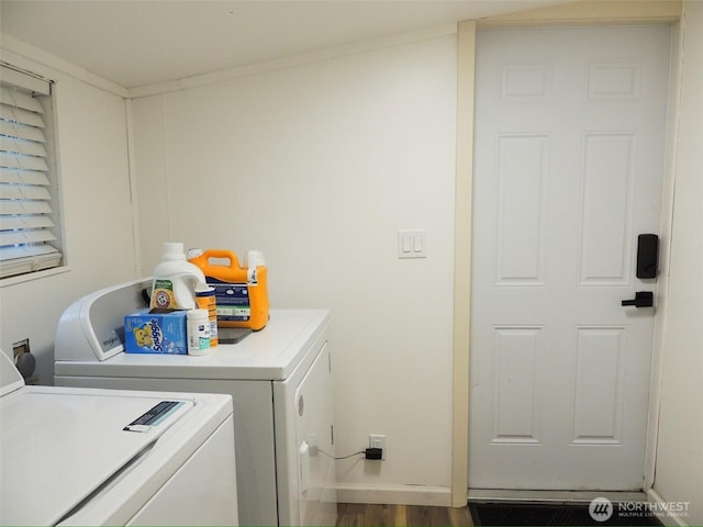 14808 131st Ave SE, Renton, WA 98058 - washroom with washer and clothes dryer and wood finished floors