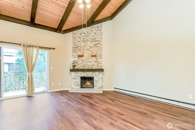 7308 N Skyview Ln Unit I-304, Tacoma, WA 98406 - unfurnished living room featuring a wood ceiling with exposed beams, wood finished floors, a baseboard heating unit, a stone fireplace, and high vaulted ceiling
