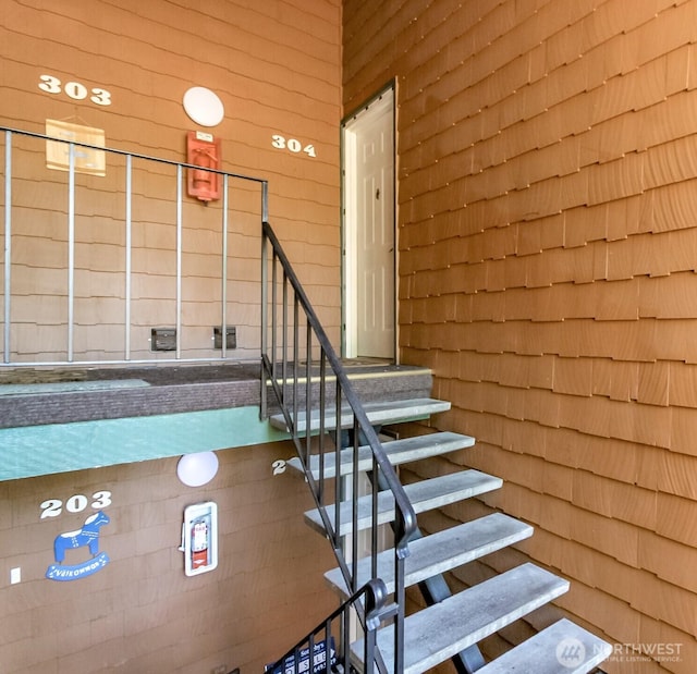 7308 N Skyview Ln Unit I-304, Tacoma, WA 98406 - stairway with wood walls