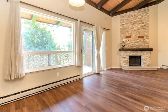 7308 N Skyview Ln Unit I-304, Tacoma, WA 98406 - unfurnished living room with a baseboard radiator, wood ceiling, plenty of natural light, wood finished floors, and a fireplace
